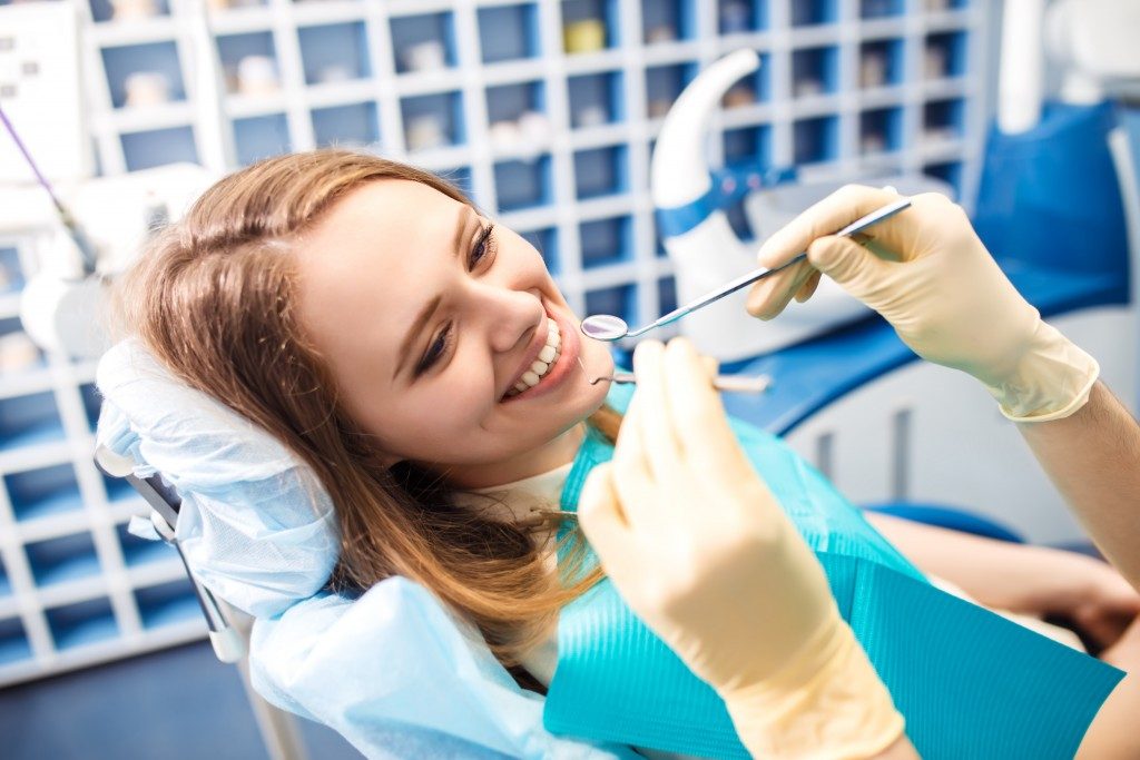 Woman about to go a root canal treatment