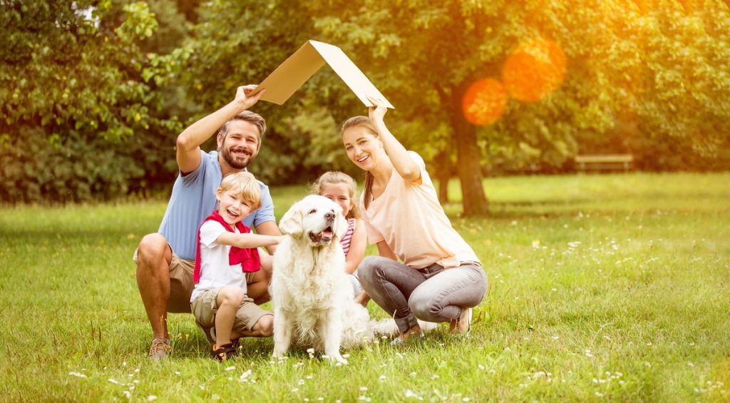 Family with their dog in new home concept