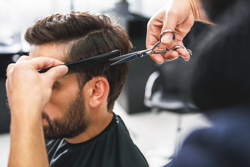 person having haircut