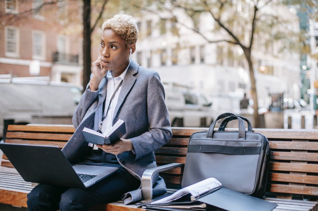 woman doing work at a park