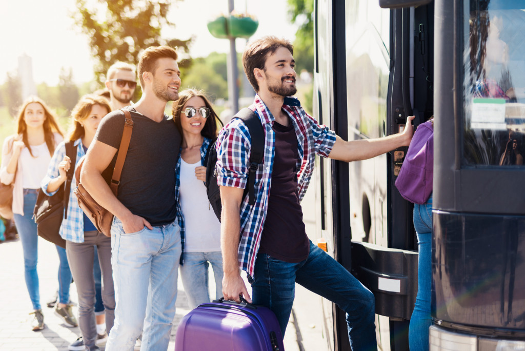 tourists boarding a bus