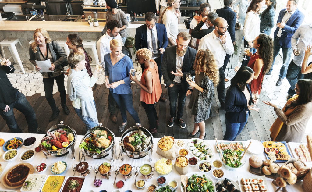 Guests enjoying food and drinks in a event