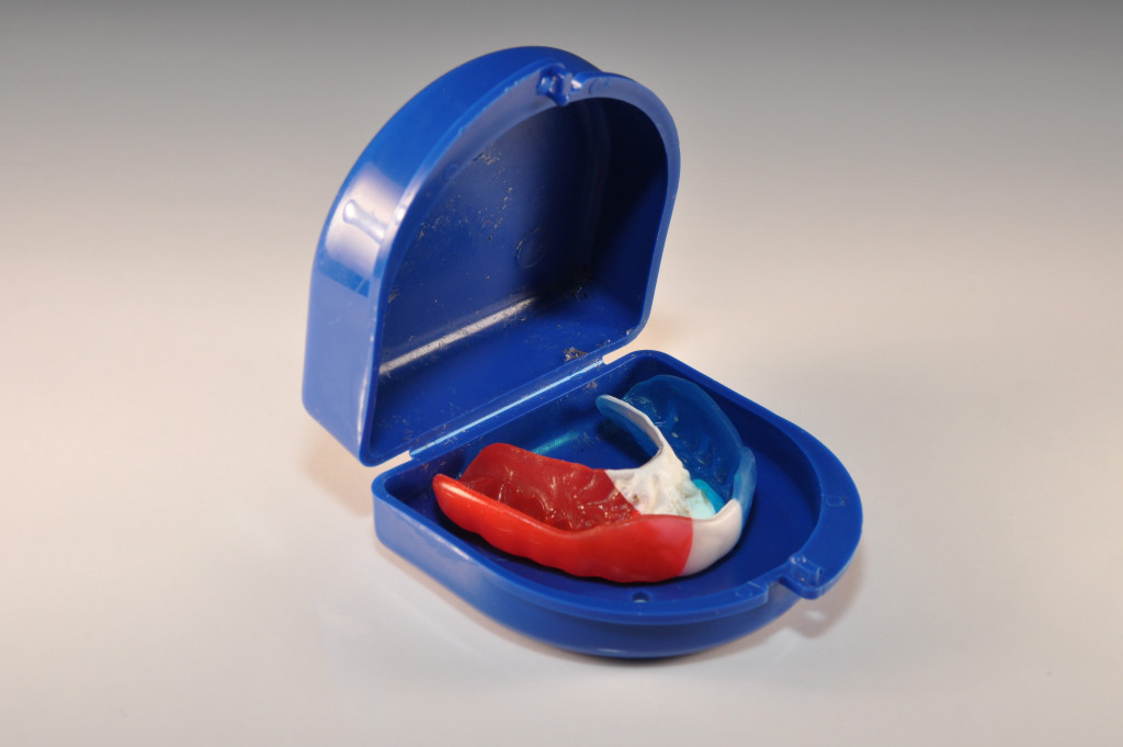 a mouth guard in a blue case