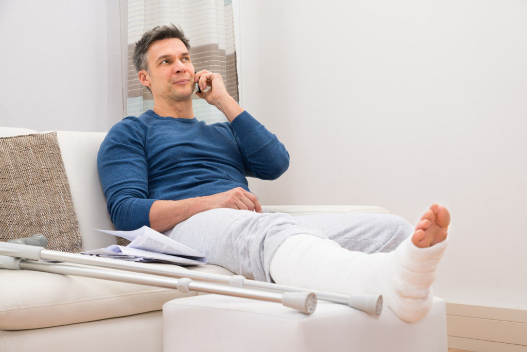 man with injury on a phone