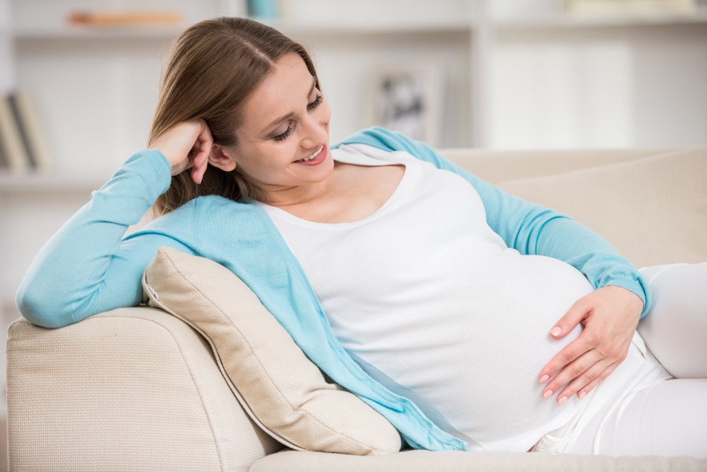 pregnant woman in the couch