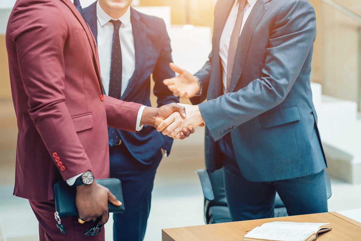 two business people shaking hands