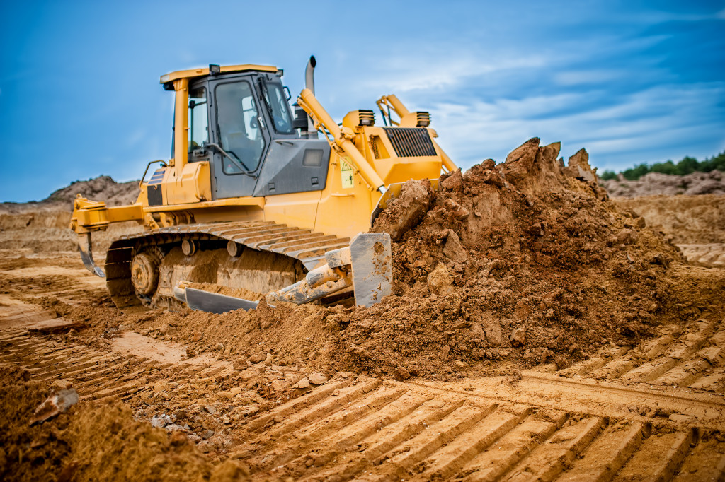 Excavating land