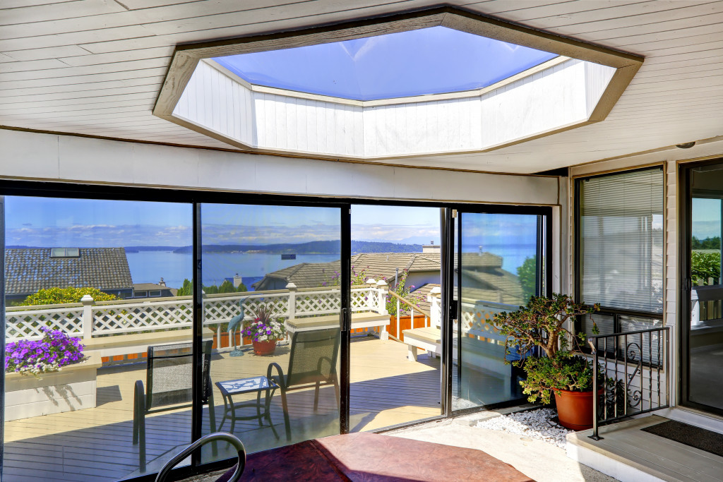 A geometric skylight in the middle of the roof of a modern home