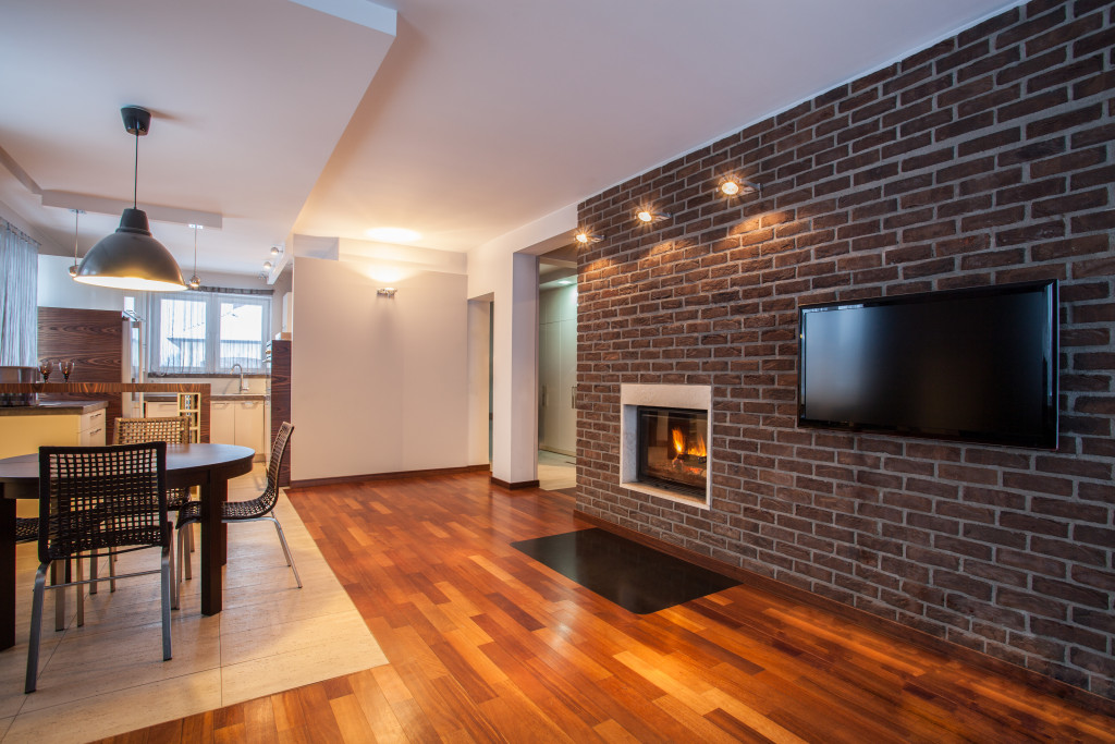 country home with brick wall and fireplace